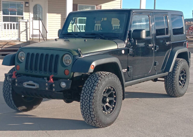 2012 Jeep Wrangler Unlimited for sale at Central City Auto West in Lewistown MT