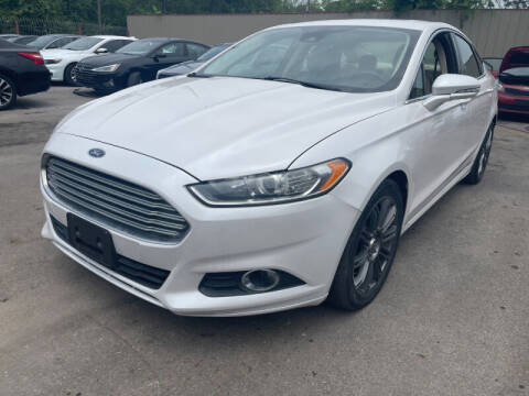 2013 Ford Fusion Hybrid for sale at Sam's Auto Sales in Houston TX