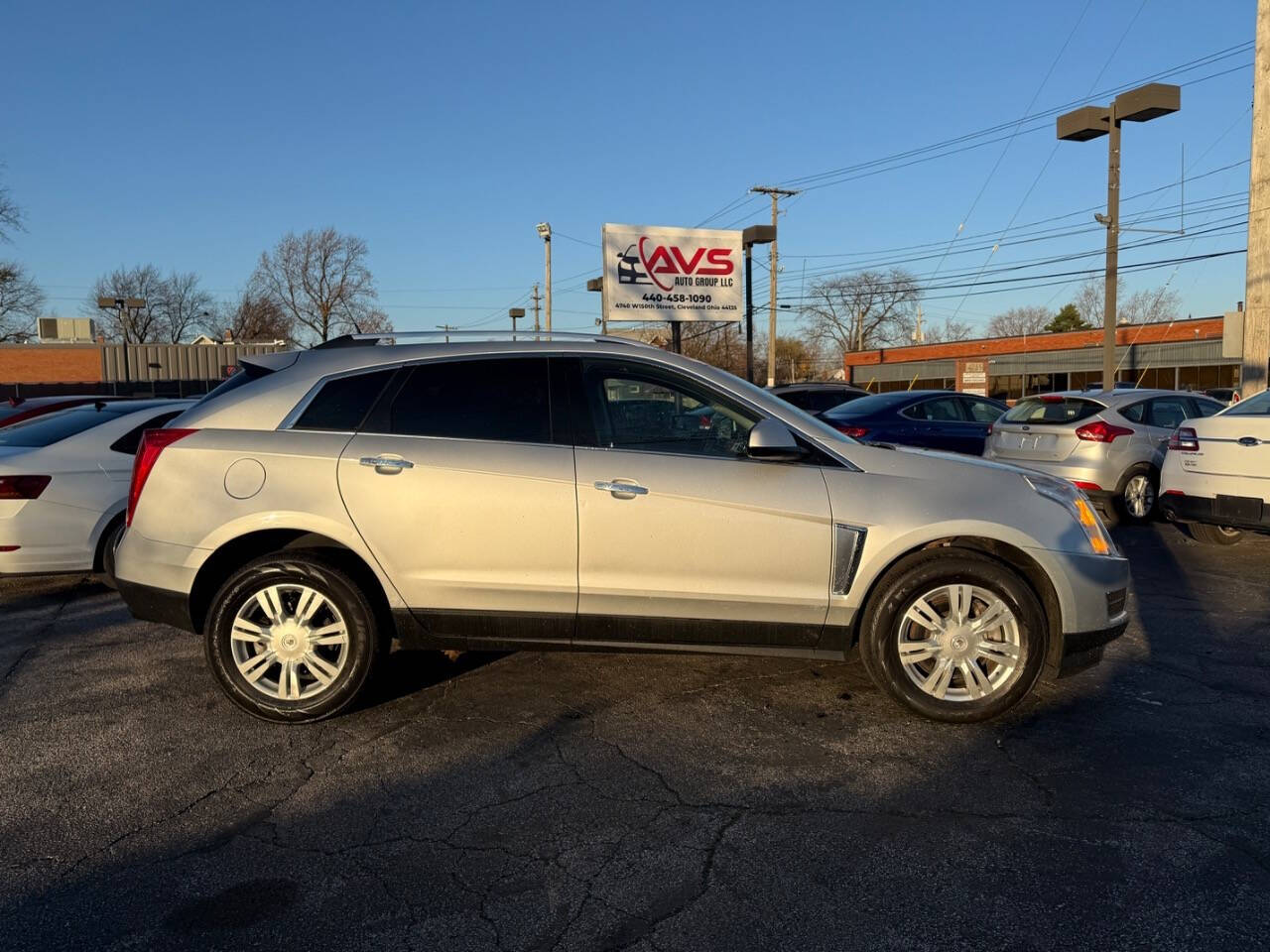 2014 Cadillac SRX for sale at AVS AUTO GROUP LLC in CLEVELAND, OH