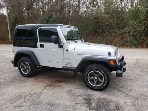 2004 Jeep Wrangler for sale at GEORGIA AUTO DEALER LLC in Buford GA