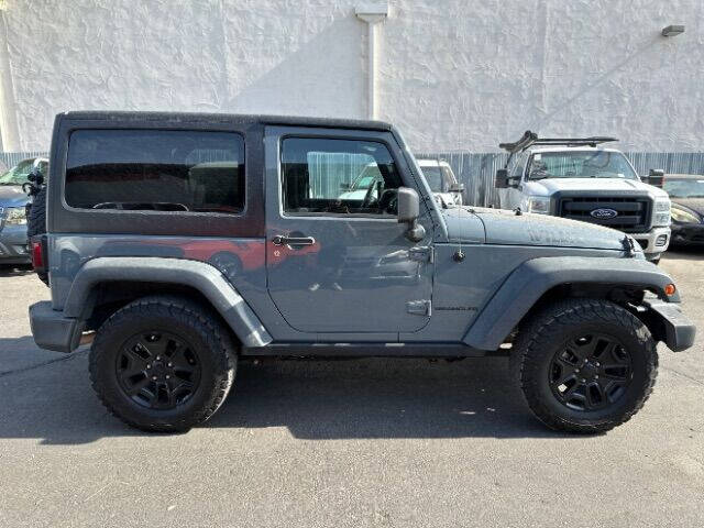 Used 2014 Jeep Wrangler Willys Wheeler with VIN 1C4AJWAG7EL325945 for sale in Mesa, AZ