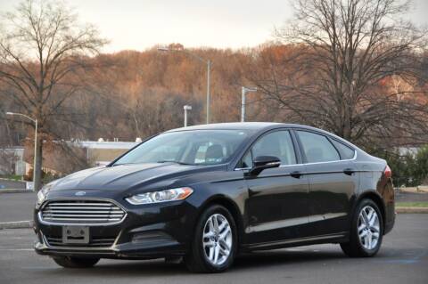 2014 Ford Fusion for sale at T CAR CARE INC in Philadelphia PA