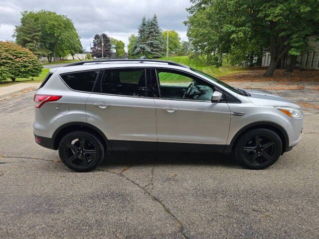 2013 Ford Escape for sale at WAGNER AUTO MART LLC in Ann Arbor, MI