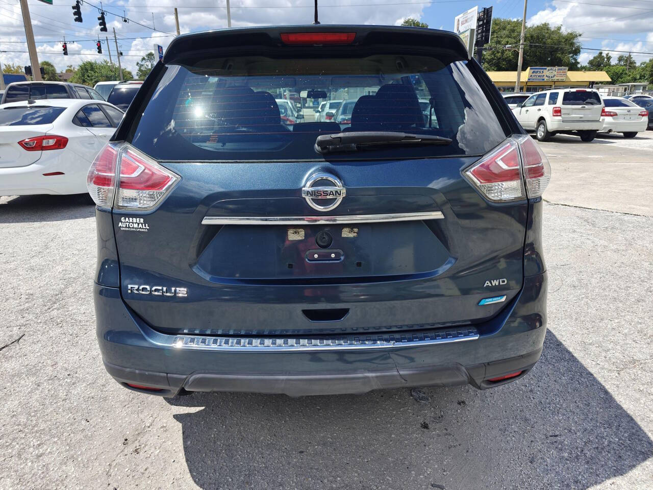 2014 Nissan Rogue for sale at EZ MOTOR ORLANDO in Orlando, FL