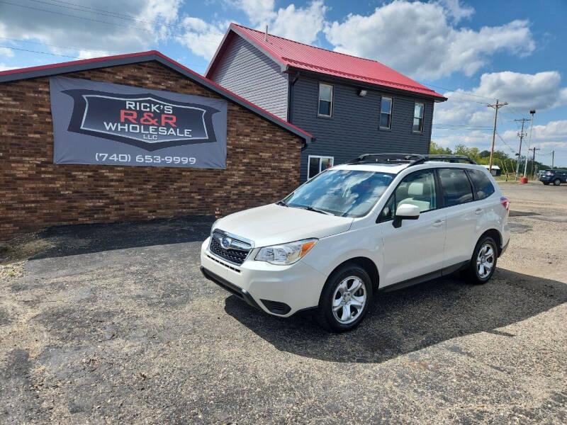 2014 Subaru Forester for sale at Rick's R & R Wholesale, LLC in Lancaster OH