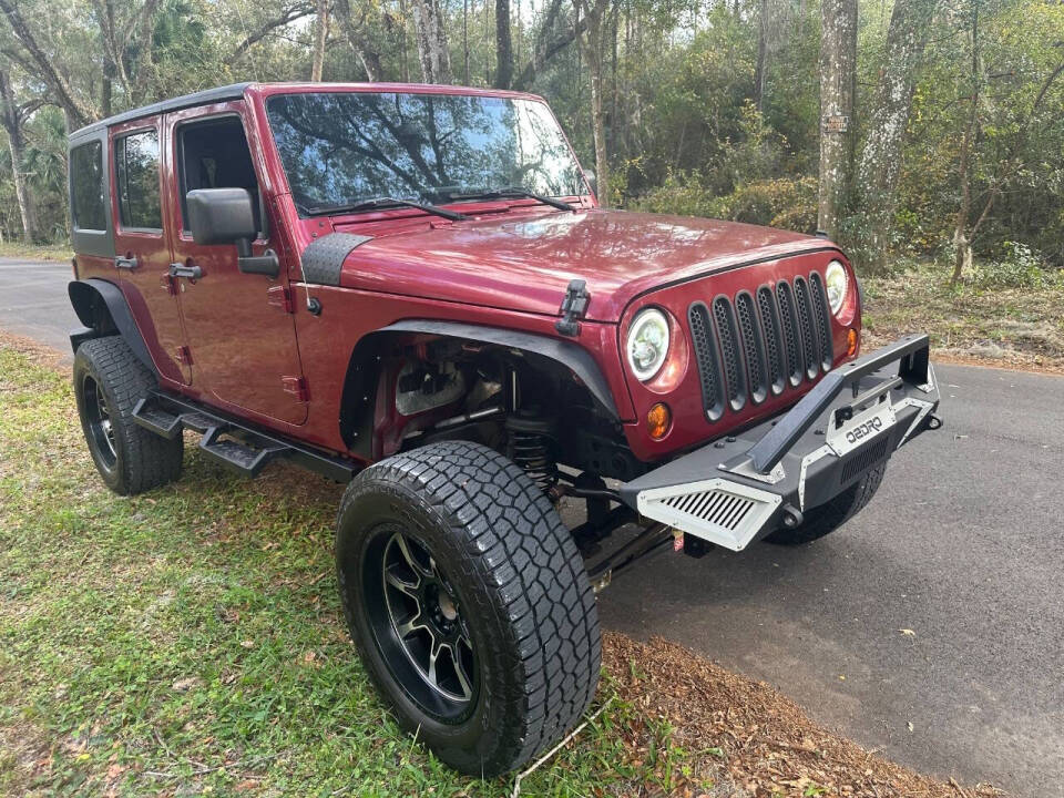 2013 Jeep Wrangler Unlimited for sale at SOUTHERN AUTO WHOLESALERS in Deland, FL