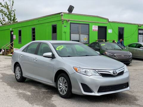 2014 Toyota Camry for sale at Marvin Motors in Kissimmee FL