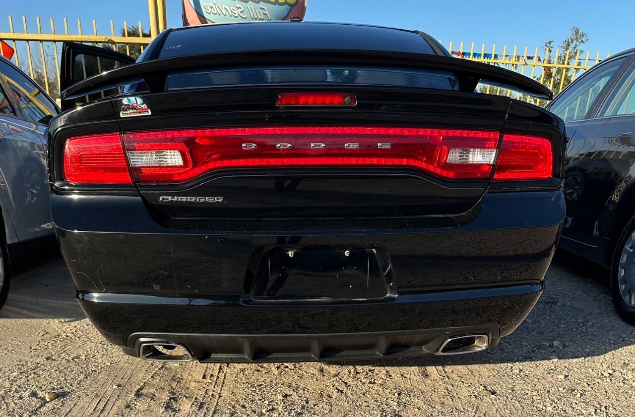 2013 Dodge Charger for sale at Familia Motors in Houston, TX