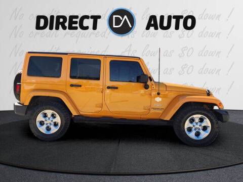 2013 Jeep Wrangler Unlimited for sale at Direct Auto in Biloxi MS