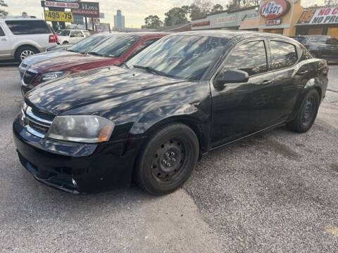 2014 Dodge Avenger for sale at FREDY USED CAR SALES in Houston TX