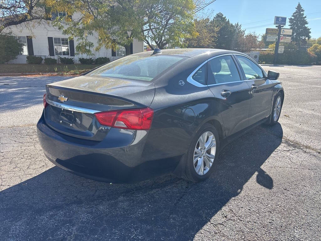 2014 Chevrolet Impala for sale at DECKER AUTO SALES in Bay City, MI