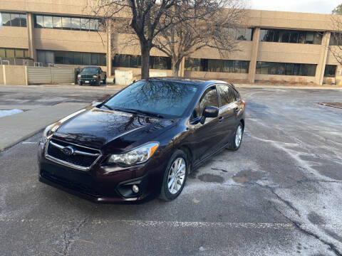 2013 Subaru Impreza for sale at QUEST MOTORS in Englewood CO