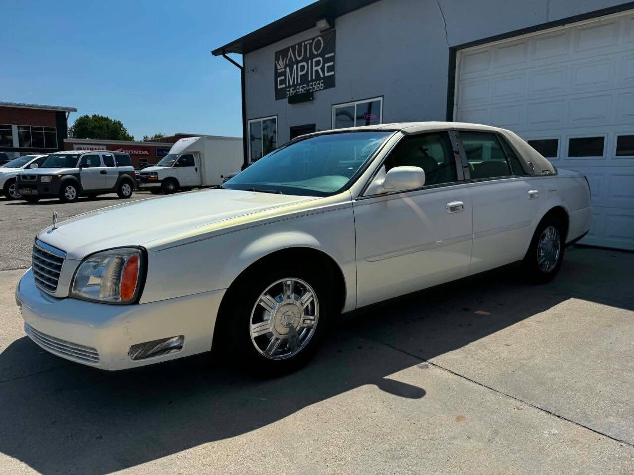Off white 2004 Cadillac DeVille Base 4dr Sedan 1