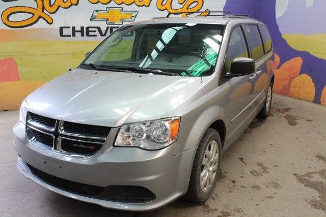 Used 2016 Dodge Grand Caravan SXT with VIN 2C4RDGBG3GR225527 for sale in Grand Ledge, MI