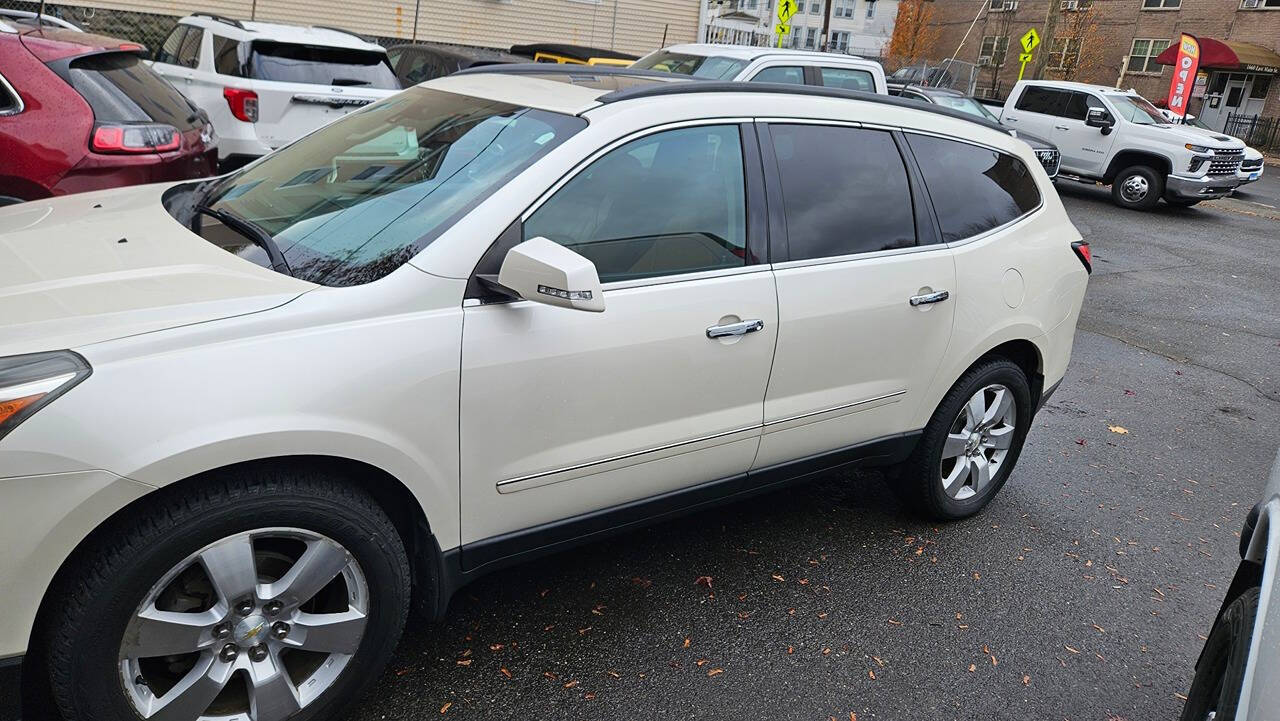 2014 Chevrolet Traverse for sale at RENOS AUTO SALES LLC in Waterbury, CT