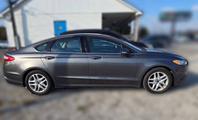 2014 Ford Fusion for sale at Advance Auto Sales in Florence, AL