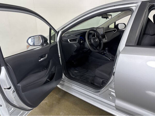 Used 2021 Toyota Corolla LE with VIN JTDEAMDE4MJ003967 for sale in Madison, WI