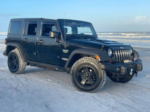 2012 Jeep Wrangler for sale at Classic Car Deals in Cadillac MI