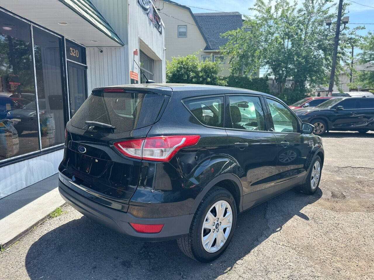 2013 Ford Escape for sale at MBM Group LLC Auto Sales in Kearny, NJ