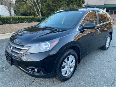 2012 Honda CR-V for sale at Triangle Motors Inc in Raleigh NC