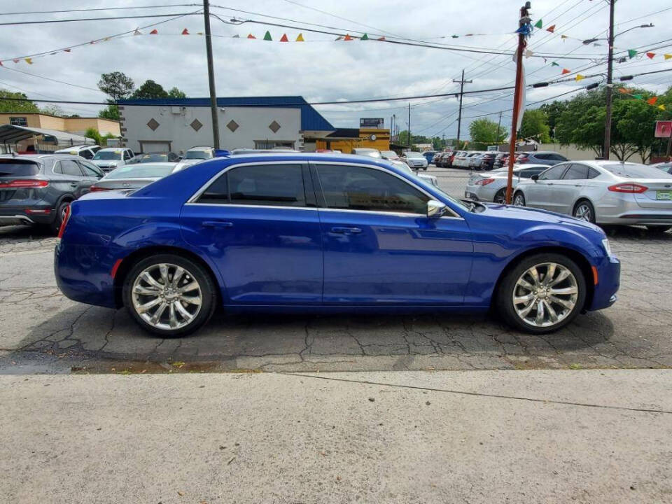 2018 Chrysler 300 for sale at DAGO'S AUTO SALES LLC in Dalton, GA