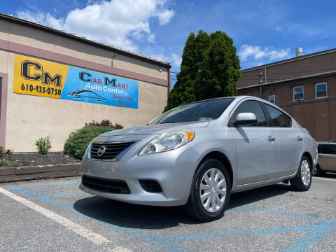 2013 Nissan Versa for sale at Car Mart Auto Center II, LLC in Allentown PA