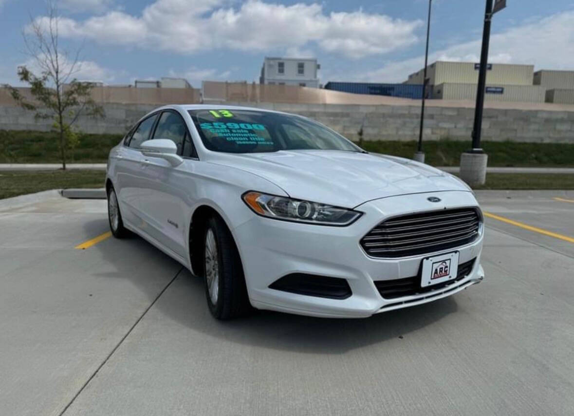 2013 Ford Fusion Hybrid for sale at Arc Auto Sales in Omaha, NE