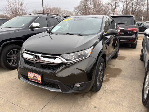 2018 Honda CR-V for sale at Azteca Auto Sales LLC in Des Moines IA