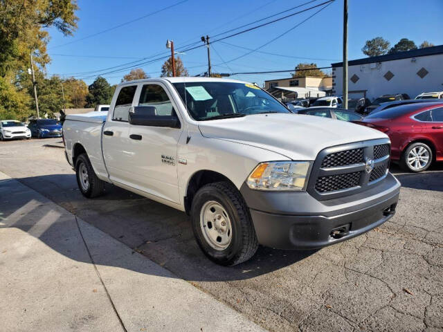 2014 Ram 1500 for sale at DAGO'S AUTO SALES LLC in Dalton, GA