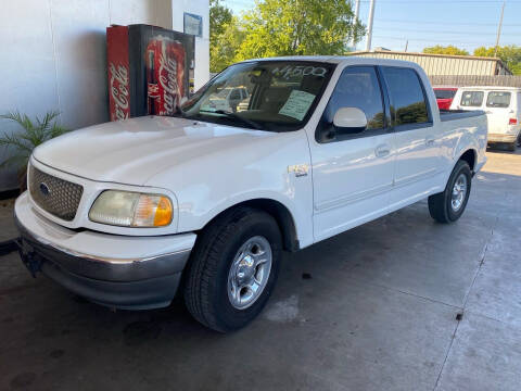 2003 Ford F-150 for sale at Buy-Fast Autos in Houston TX