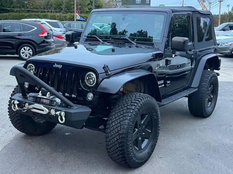 2015 Jeep Wrangler for sale at Capital Motors in Raleigh NC