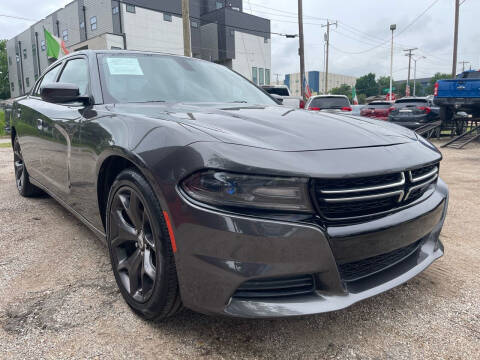 2019 Dodge Charger for sale at LLANOS AUTO SALES LLC in Dallas TX
