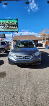 2014 Honda CR-V for sale at Queen Auto Sales in Denver CO