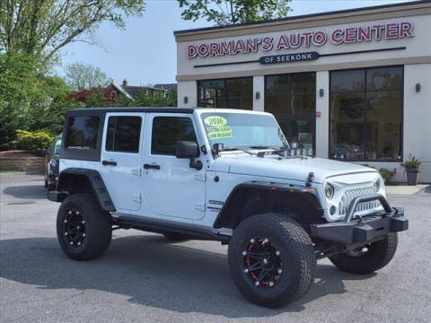 2016 Jeep Wrangler Unlimited for sale at DORMANS AUTO CENTER OF SEEKONK in Seekonk MA