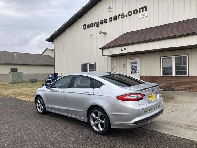 2014 Ford Fusion for sale at GEORGE'S CARS.COM INC in Waseca MN