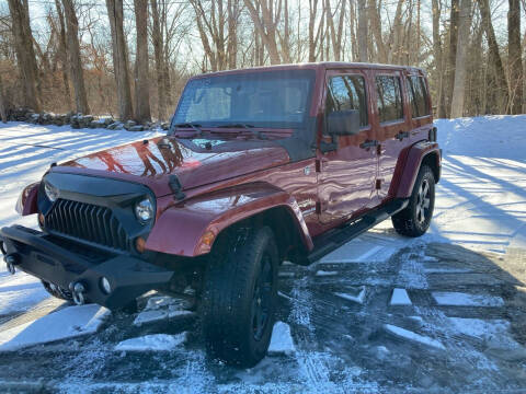 2012 Jeep Wrangler Unlimited for sale at Lou Rivers Used Cars in Palmer MA