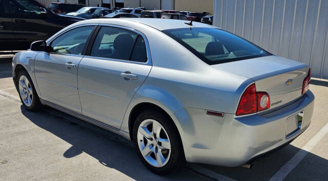 2010 Chevrolet Malibu for sale at CAR MARKET AUTO GROUP in Sugar Land, TX