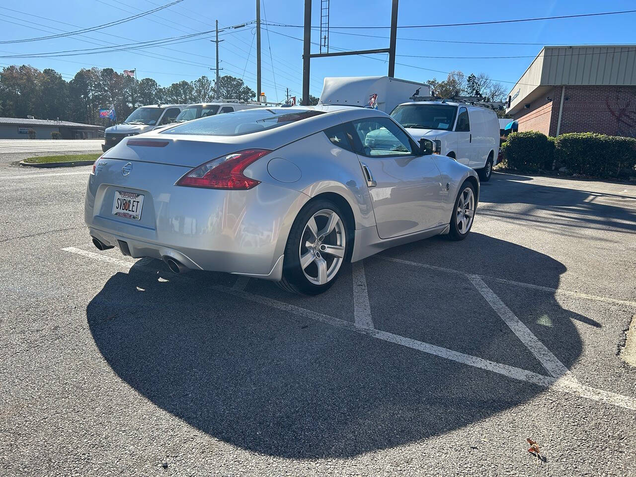 2009 Nissan 370Z for sale at Justin Hughes Auto Group LLC in Douglasville, GA