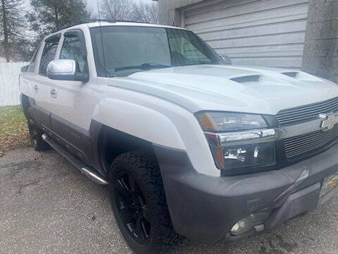 2004 Chevrolet Avalanche for sale at Changing Lane Auto Group in Davie FL