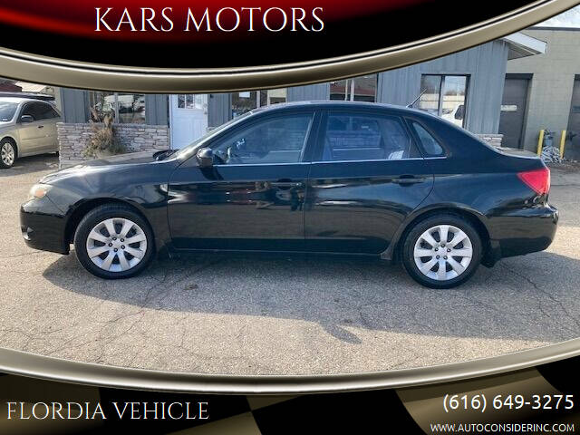 2009 Subaru Impreza for sale at KARS MOTORS in Wyoming MI