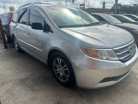 2012 Honda Odyssey for sale at Buy-Fast Autos in Houston TX