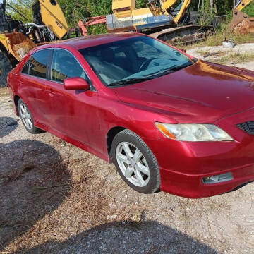 2009 Toyota Camry for sale at SCOTT HARRISON MOTOR CO in Houston TX