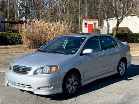 2005 Toyota Corolla for sale at Triangle Motors Inc in Raleigh NC