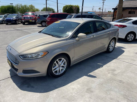 2015 Ford Fusion for sale at Ta Ta's Auto Group LLC in Gadsden AZ