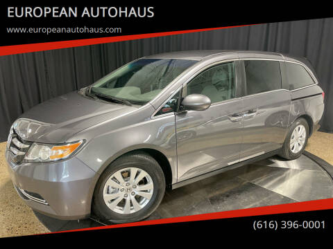 2014 Honda Odyssey for sale at EUROPEAN AUTOHAUS in Holland MI