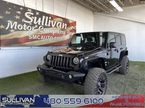 2013 Jeep Wrangler Unlimited for sale at SULLIVAN MOTOR COMPANY INC. in Mesa AZ