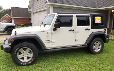 2010 Jeep Wrangler Unlimited for sale at Albany Auto Center in Albany GA