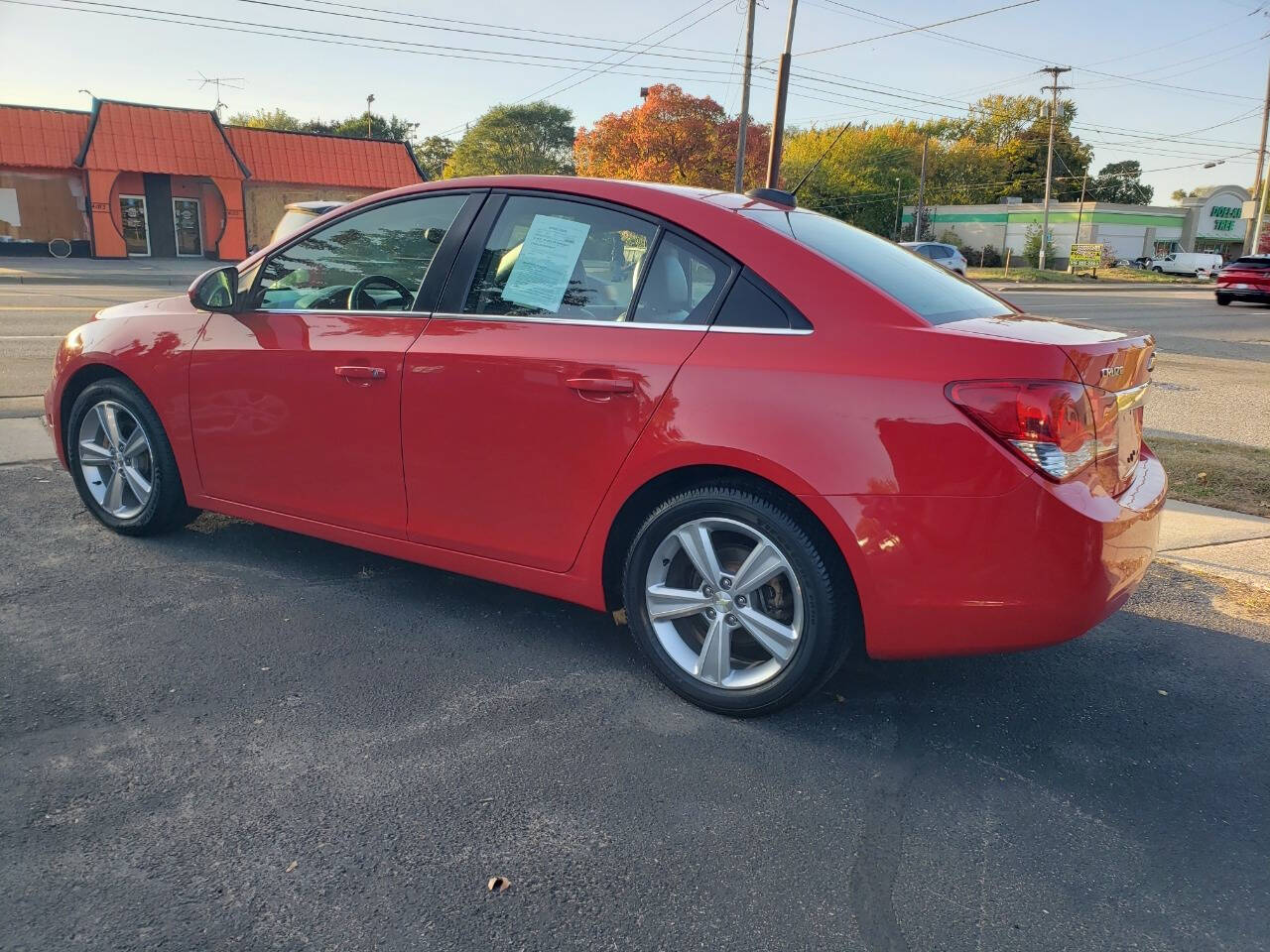 2015 Chevrolet Cruze for sale at Auto Shop in Wyoming, MI