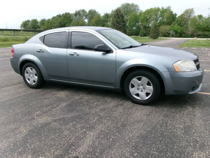 2010 Dodge Avenger for sale at Crossroads Used Cars Inc. in Tremont IL