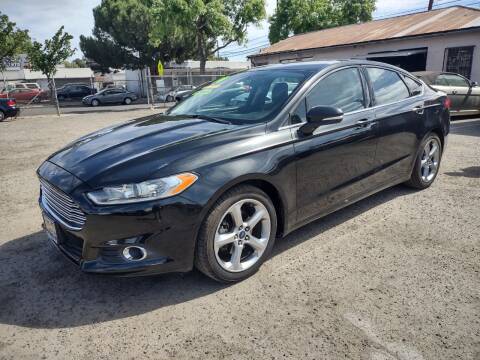 2014 Ford Fusion for sale at Larry's Auto Sales Inc. in Fresno CA